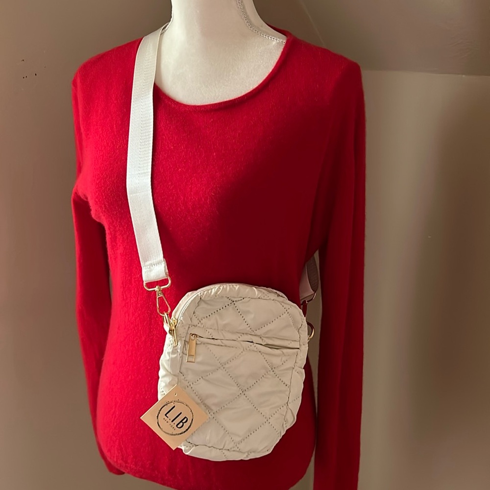 New with tags L.I.B. Puffy cross body purse. Cream Off white.